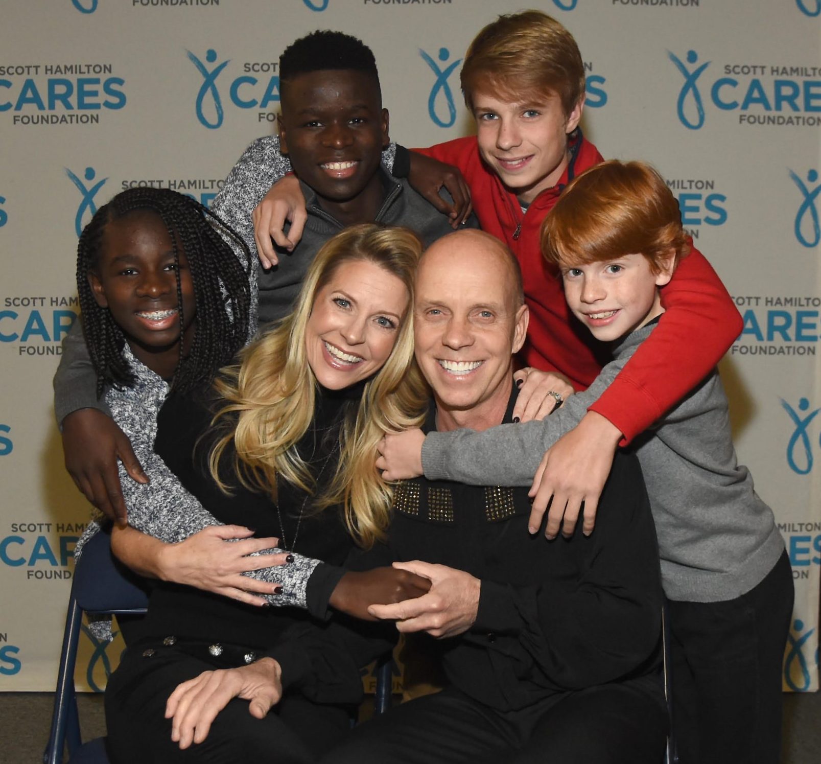 NASHVILLE, TN - NOVEMBER 19:  (L-R) Eveline, Tracie, Jen Paul, Scott, Adien and Max Hamilton take photos before the second annual "An Evening Of Scott Hamilton &amp; Friends" hosted by Scott Hamilton to benefit The Scott Hamilton CARES Foundation on November 19, 2017 in Nashville, Tennessee.  (Photo by Rick Diamond/Getty Images for Scott Hamilton CARES)